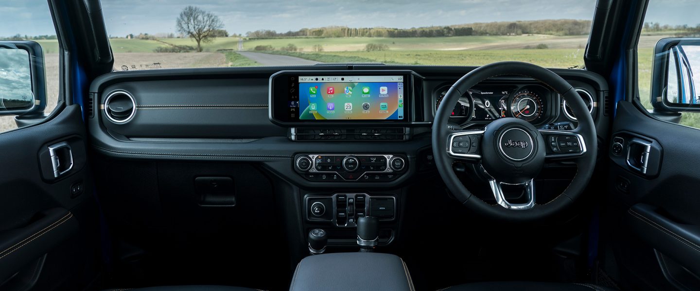 A close-up of the Uconnect touchscreen in the 2025 Jeep Wrangler